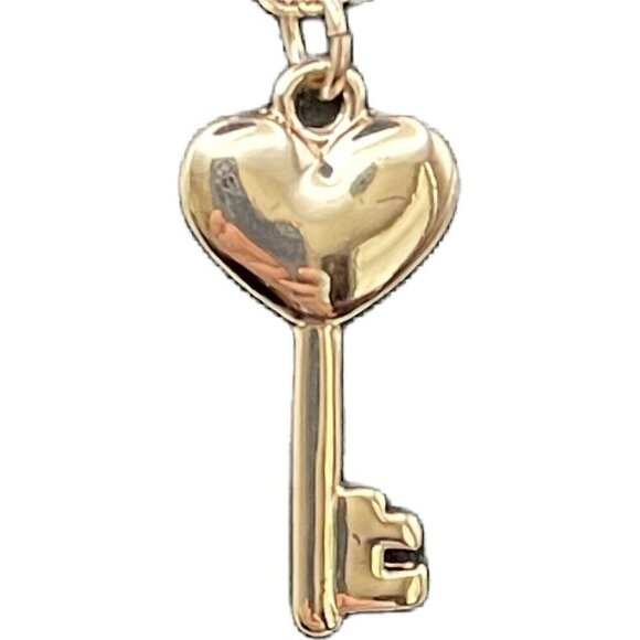 Guess Rose Gold Pave Crystal Lock-Key-Heart Charms Triple Strand Chain Necklace - Picture 6 of 7